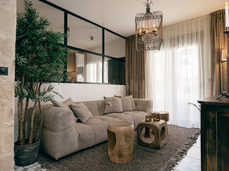 Exceptional designer apartment with private entrance, garage and elegant terraces, perfectly located just moments from the promenade and the beautiful beaches of Playa del Cura.