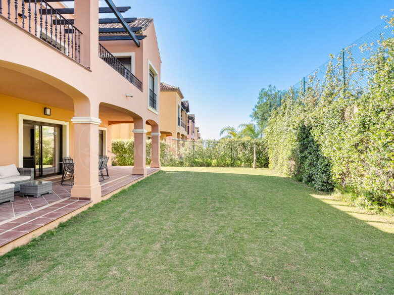 4 bedroom townhouse with basement and garden on the first line of golf in Estepona.