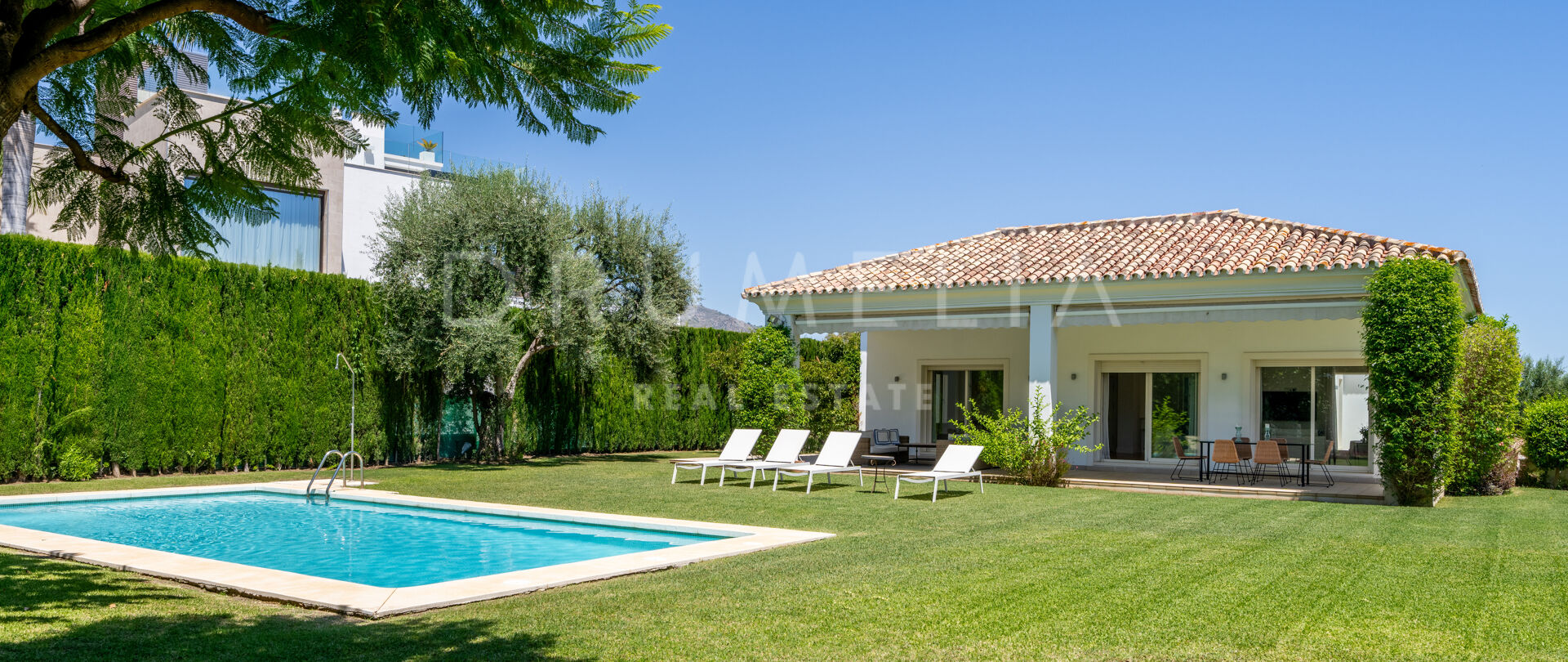 Charming luxury villa of modern Andalusian-style in Altos de Puente Romano, Marbella’s Golden Mile