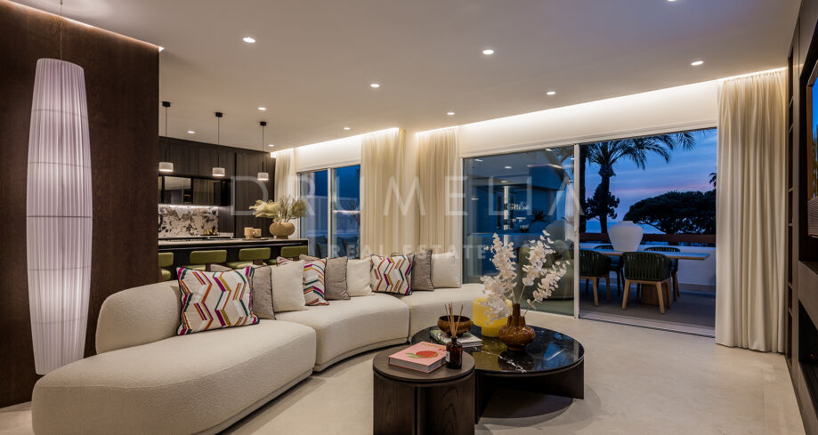 Elegant, modern beachfront apartment with sea views in exclusive Palm Beach, Marbella East.