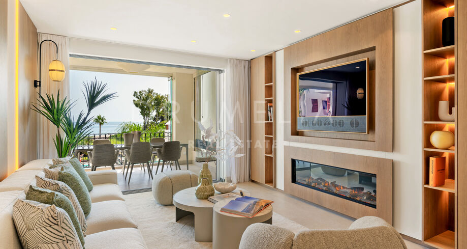 Stylishly renovated beachfront apartment in Bahía del Velerín with luxury features and sea views.