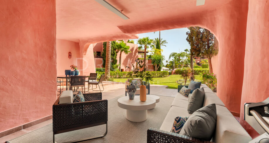 Renovated beachfront apartment in Torre Bermeja with garden views, terrace, and top amenities.