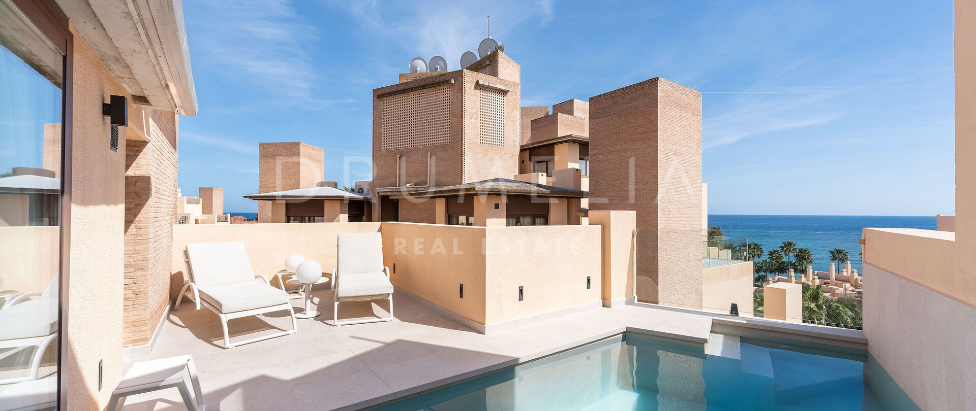 Elegant Coastal Duplex with Panoramic Sea Views in Estepona