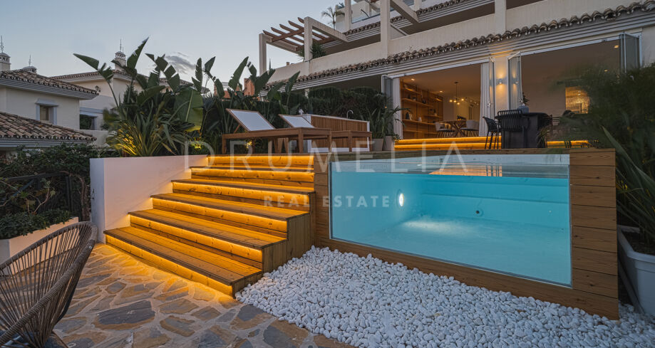 Elegante Erdgeschosswohnung mit atemberaubender Aussicht in Palacetes Los Belvederes, Nueva Andalucía