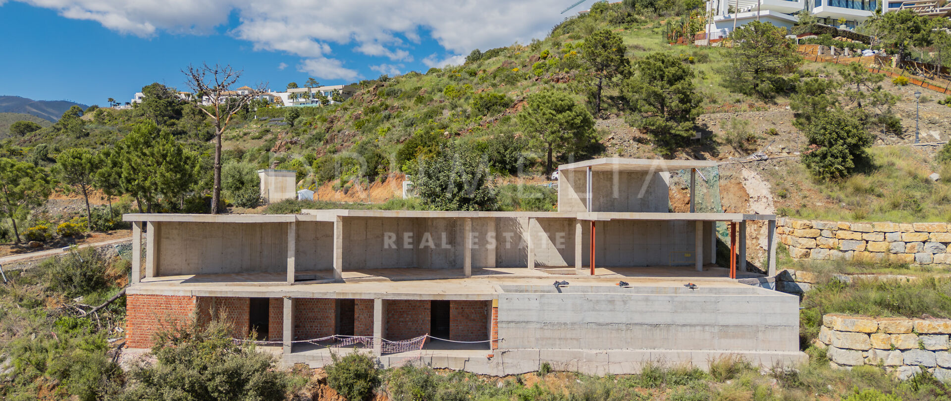 Участок в Monte Mayor с проектом виллы и панорамными видами