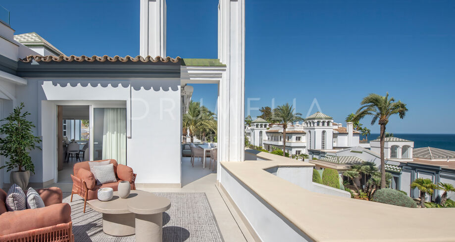 Strandnära penthouse med privat takterrass i Dominion Beach