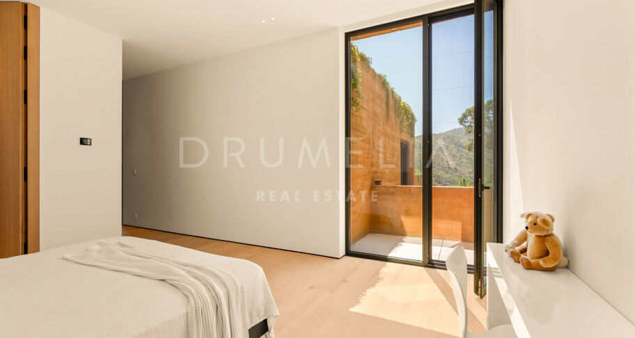 Total Privacy and Views in a Bold Hillside Villa in Monte Mayor Benahavis