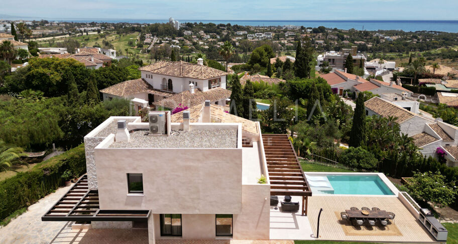 Moderne Villa im ruhigen mediterranen Stil mit Meerblick in Paraiso Alto, Benahavis