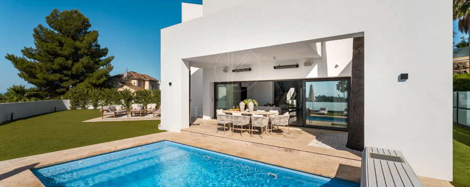 Contemporary Frontline Golf Villa with Panoramic Sea and Mountain Views