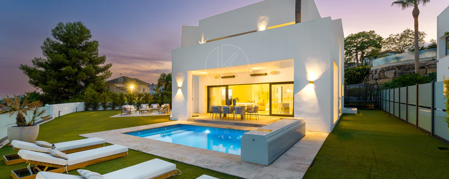 Contemporary Frontline Golf Villa with Panoramic Sea and Mountain Views