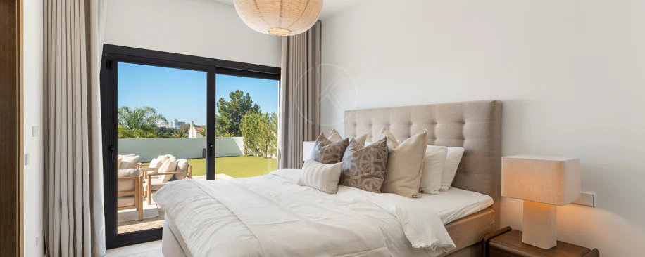Contemporary Frontline Golf Villa with Panoramic Sea and Mountain Views