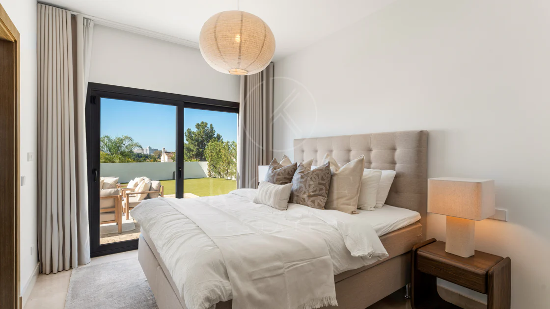 Contemporary Frontline Golf Villa with Panoramic Sea and Mountain Views