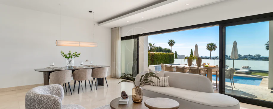 Contemporary Frontline Golf Villa with Panoramic Sea and Mountain Views
