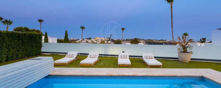 Contemporary Frontline Golf Villa with Panoramic Sea and Mountain Views
