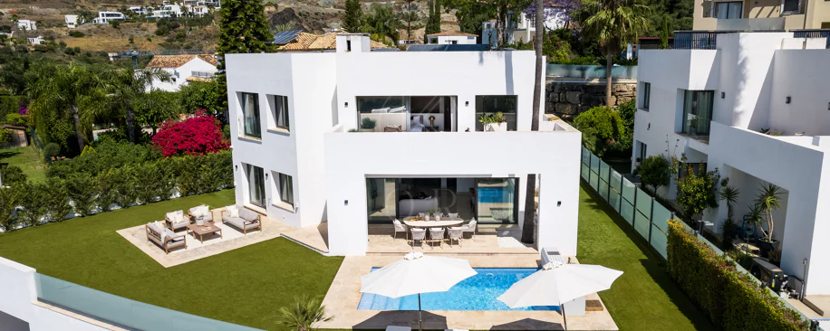 Contemporary Frontline Golf Villa with Panoramic Sea and Mountain Views