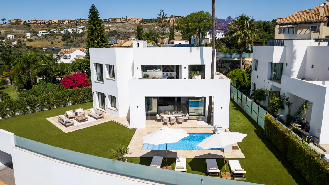 Contemporary Frontline Golf Villa with Panoramic Sea and Mountain Views
