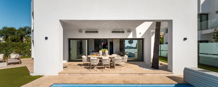 Contemporary Frontline Golf Villa with Panoramic Sea and Mountain Views