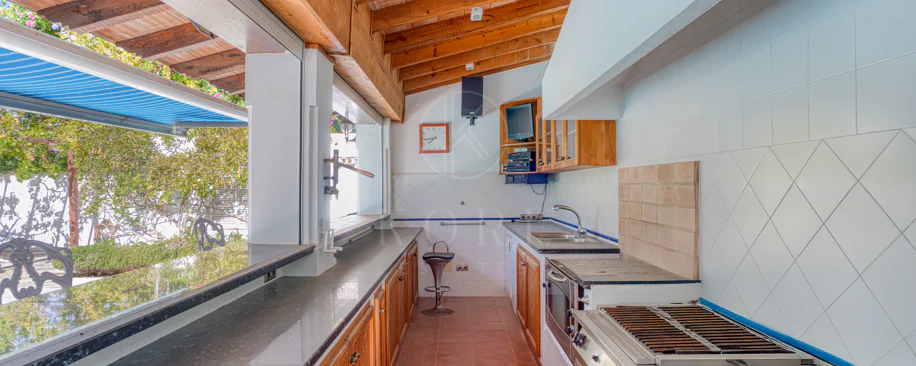 Elegant, southeast facing five bedroom Villa located on the New Golden Mile in Estepona, just steps from the beach
