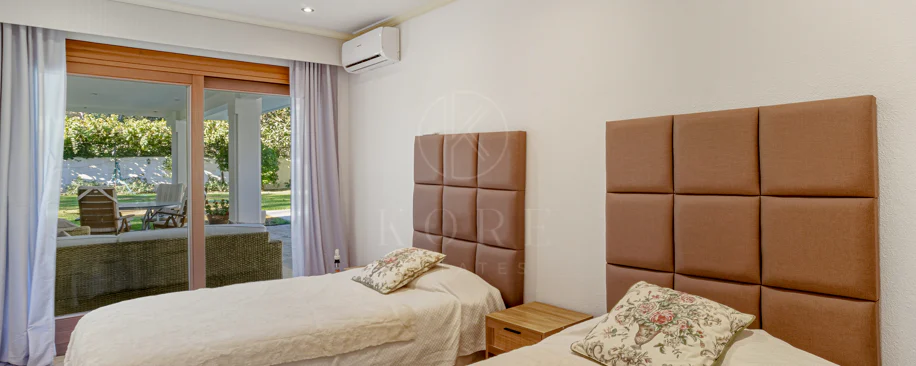Elegant, southeast facing five bedroom Villa located on the New Golden Mile in Estepona, just steps from the beach
