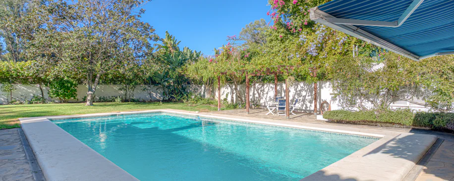 Elegant, southeast facing five bedroom Villa located on the New Golden Mile in Estepona, just steps from the beach