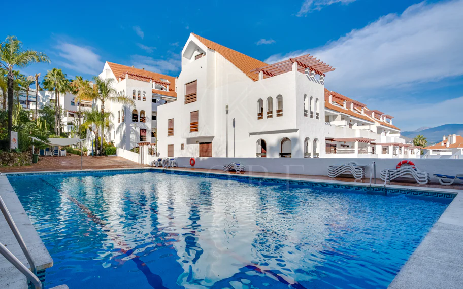 Beautifully renovated three-bedroom, east facing apartment, located in one of the most desirable complexes in Nueva Andalucia, La Maestranza.