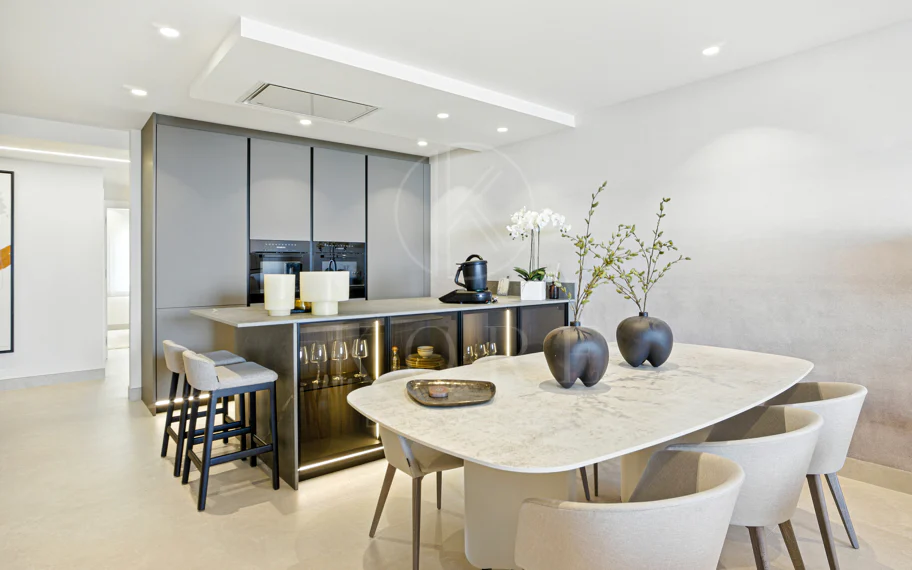 Impeccably renovated, south facing beach front, garden apartment located in the exclusive Menara Beach community on the sought-after New Golden Mile