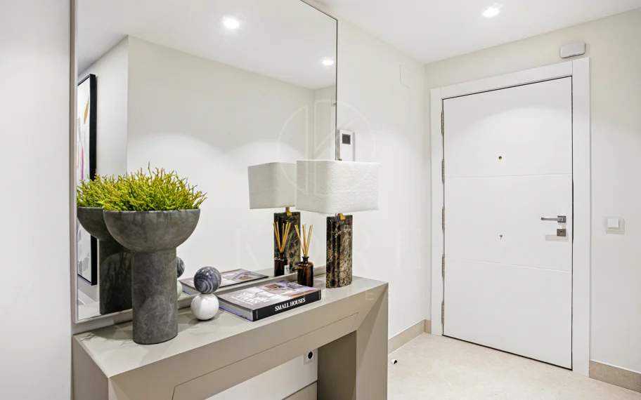 Impeccably renovated, south facing beach front, garden apartment located in the exclusive Menara Beach community on the sought-after New Golden Mile