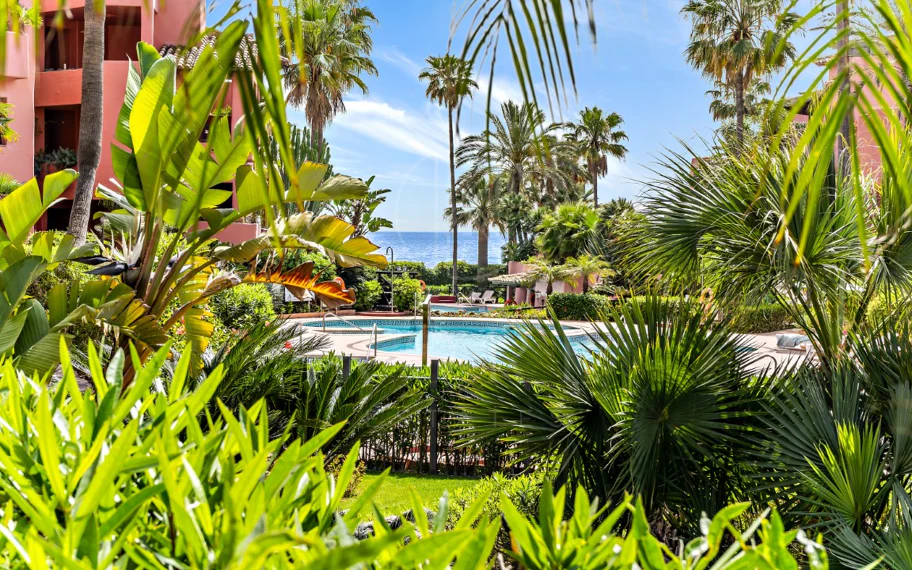 Impeccably renovated, south facing beach front, garden apartment located in the exclusive Menara Beach community on the sought-after New Golden Mile