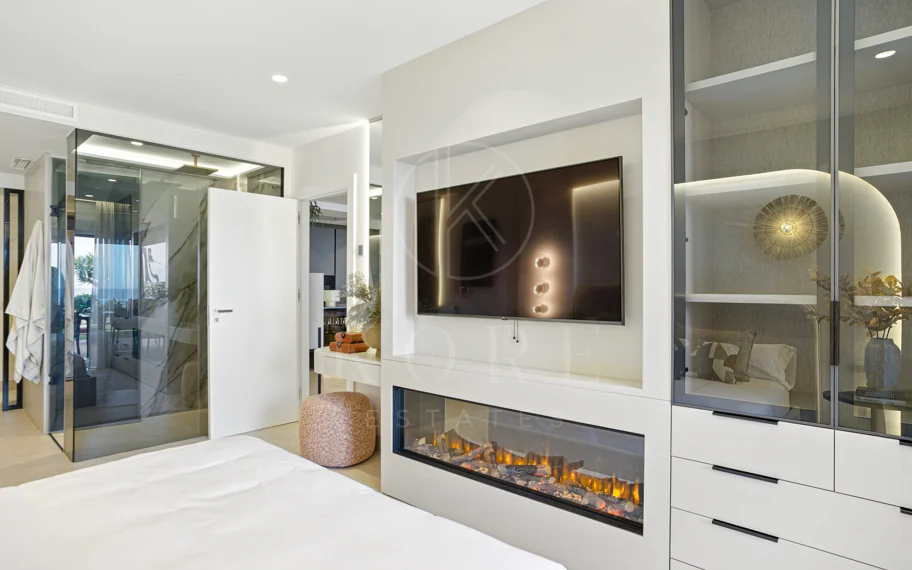 Impeccably renovated, south facing beach front, garden apartment located in the exclusive Menara Beach community on the sought-after New Golden Mile