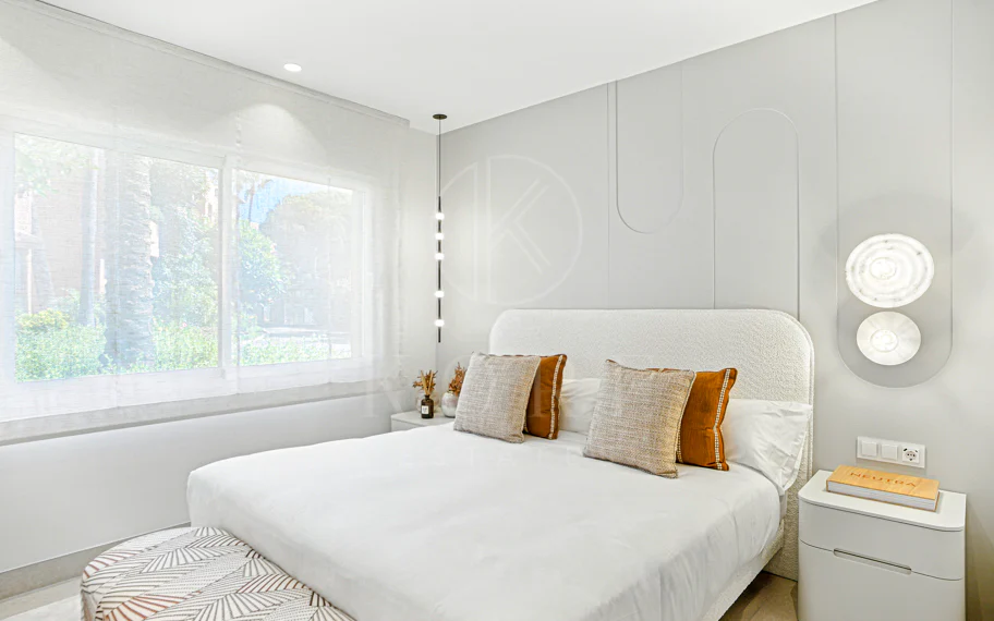Impeccably renovated, south facing beach front, garden apartment located in the exclusive Menara Beach community on the sought-after New Golden Mile
