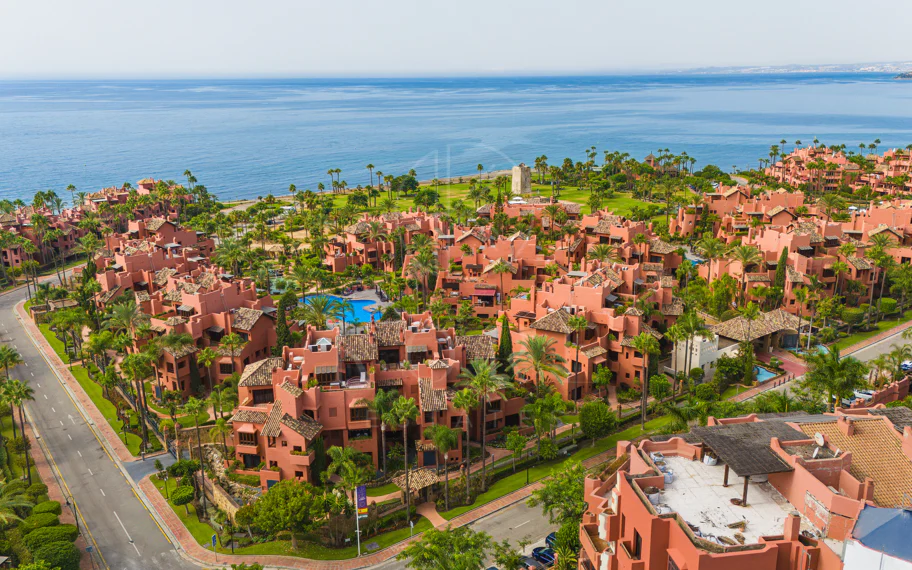 Impeccably renovated, south facing beach front, garden apartment located in the exclusive Menara Beach community on the sought-after New Golden Mile