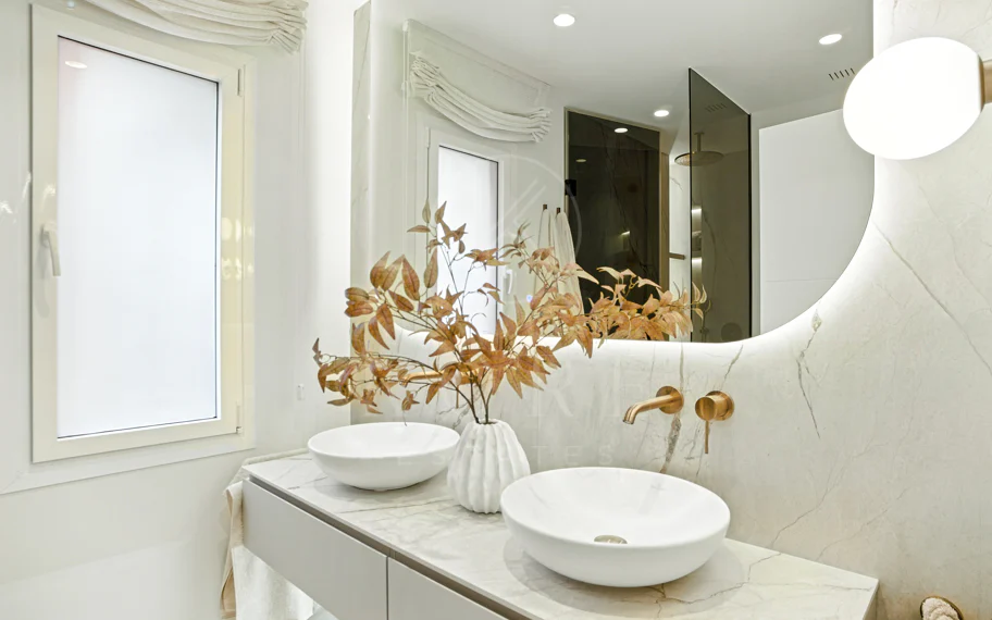Impeccably renovated, south facing beach front, garden apartment located in the exclusive Menara Beach community on the sought-after New Golden Mile