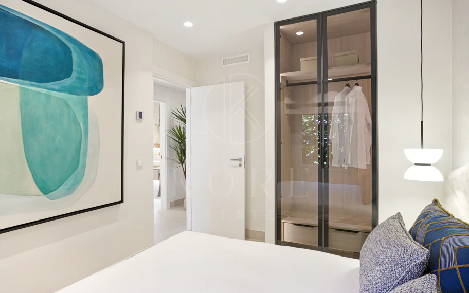 Impeccably renovated, south facing beach front, garden apartment located in the exclusive Menara Beach community on the sought-after New Golden Mile