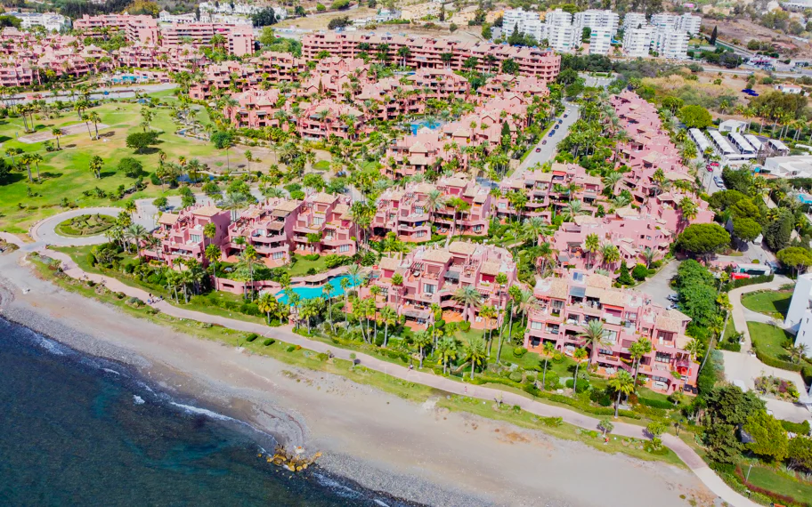 Impeccably renovated, south facing beach front, garden apartment located in the exclusive Menara Beach community on the sought-after New Golden Mile