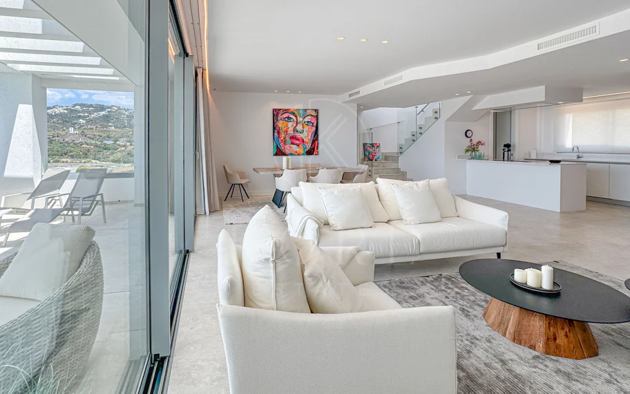 Contemporary penthouse with terrace and solarium both with panoramic views of the Mediterranean Sea in top location