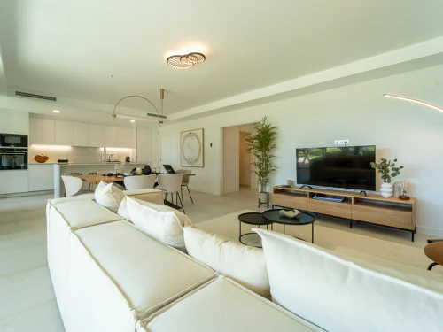 Newly built south-facing home with golf and sea views, a private garden and generous terrace in El Chaparral.