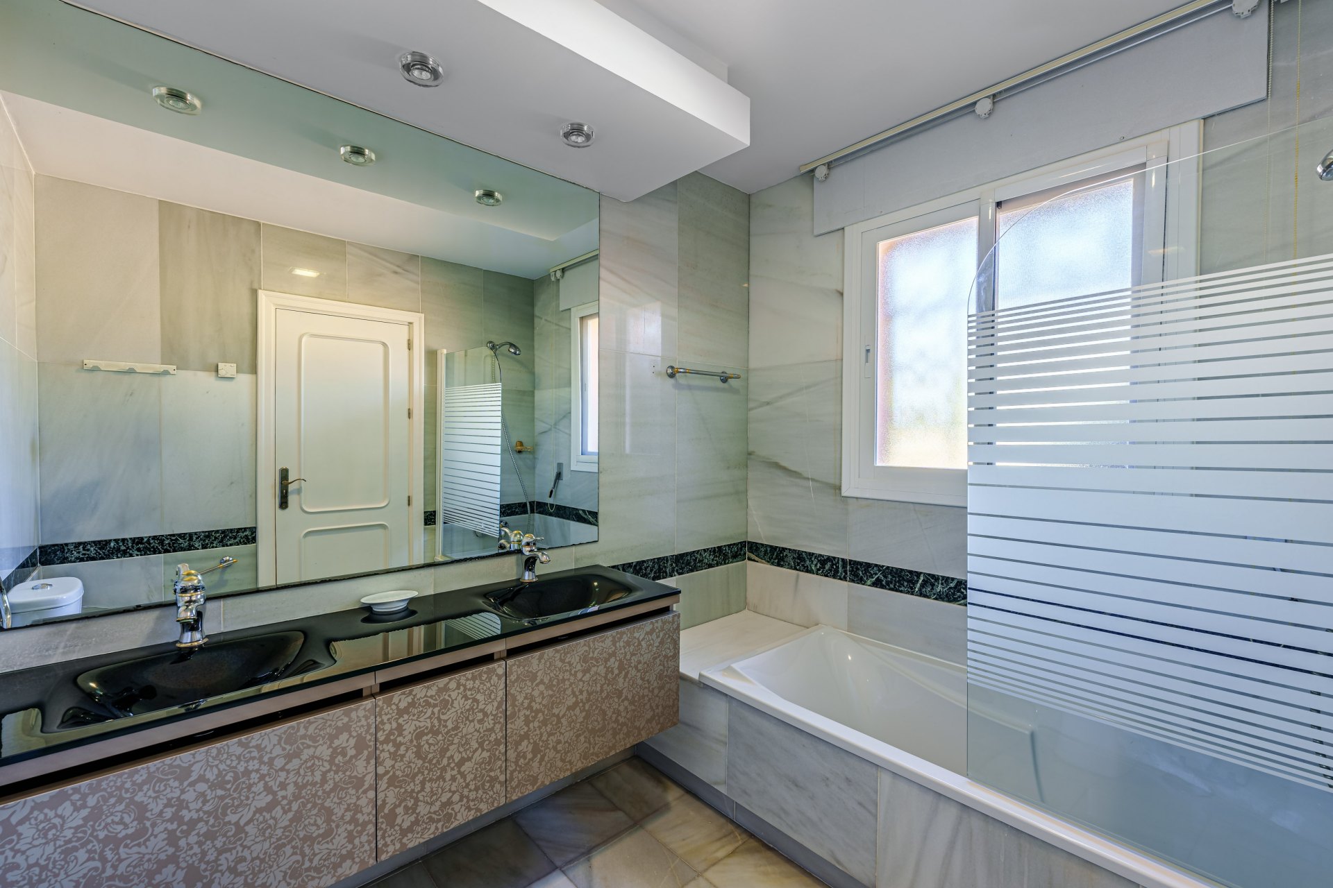 Exclusive opportunity for a large beachfront villa in Estepona, with direct access to the sea