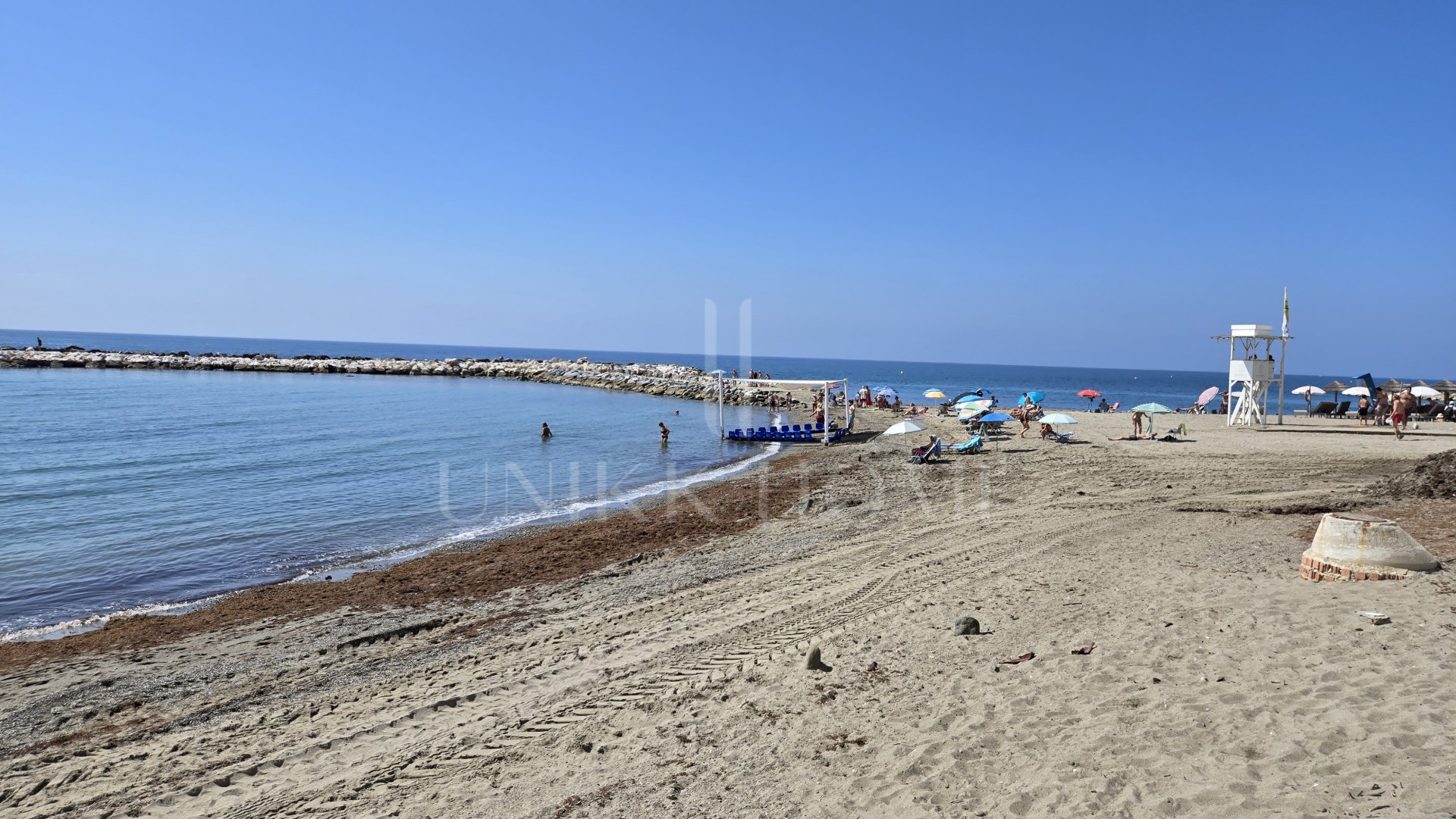 Exclusive luxury ground floor apartment with garden on the first line beach of Puerto Banús