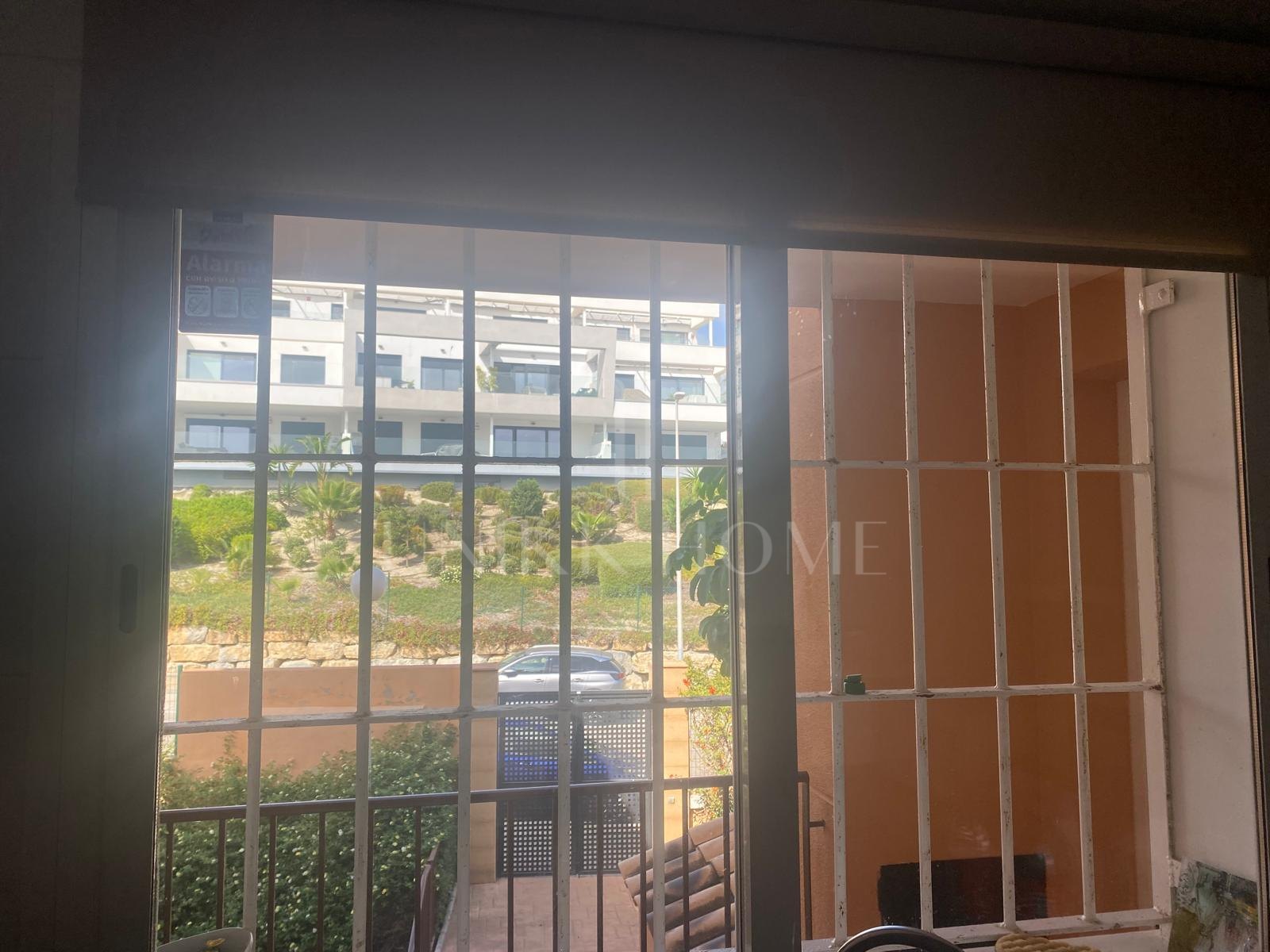 One-bedroom apartment with huge terrace and sea and golf views