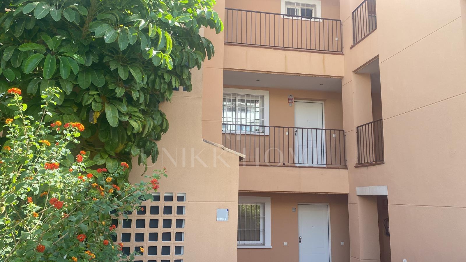 One-bedroom apartment with huge terrace and sea and golf views