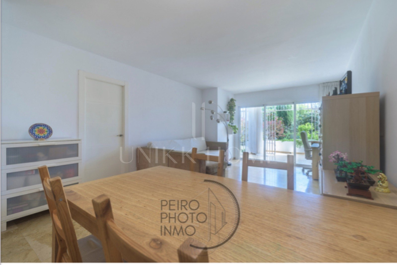 Elegant, bright apartment with large terrace & direct garden access in a tranquil gated community