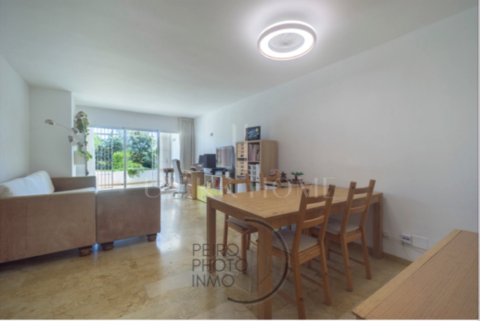 Elegant, bright apartment with large terrace & direct garden access in a tranquil gated community