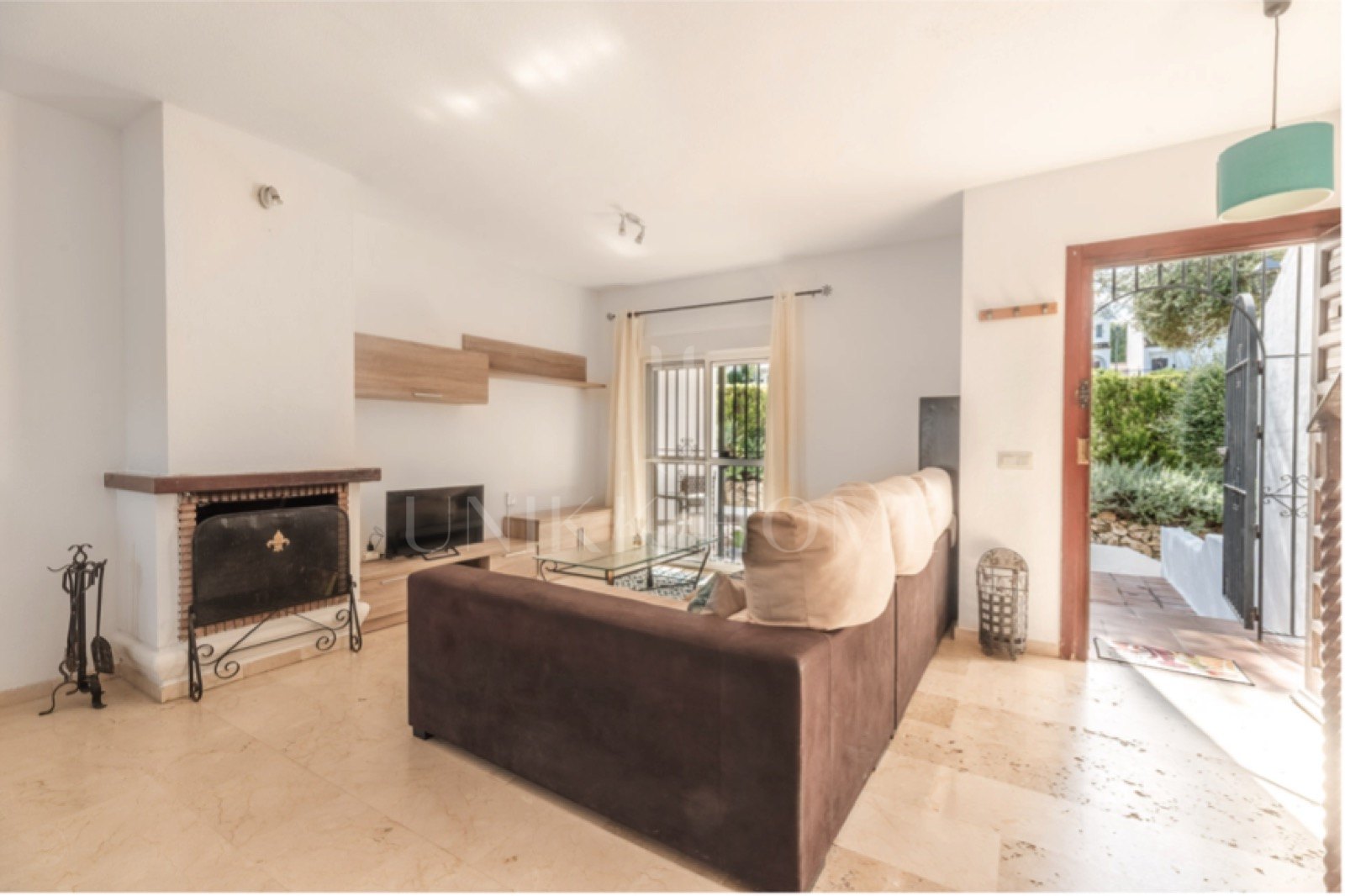 Elegant, bright apartment with large terrace & direct garden access in a tranquil gated community