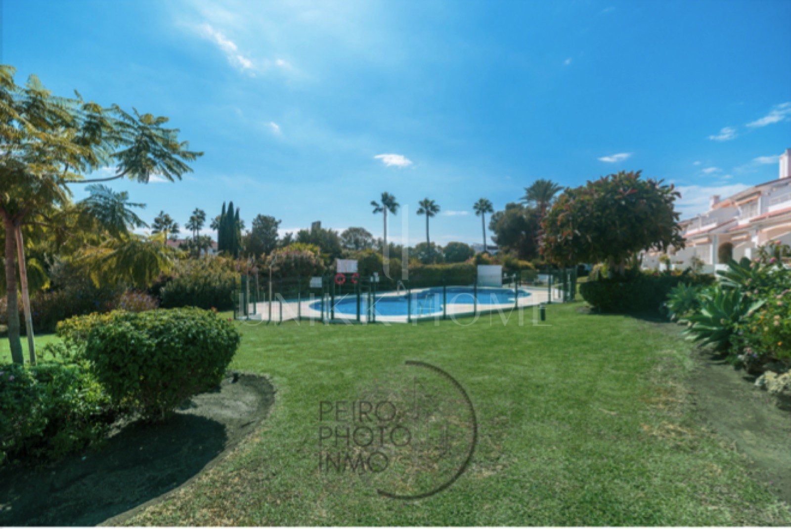 Elegant, bright apartment with large terrace & direct garden access in a tranquil gated community