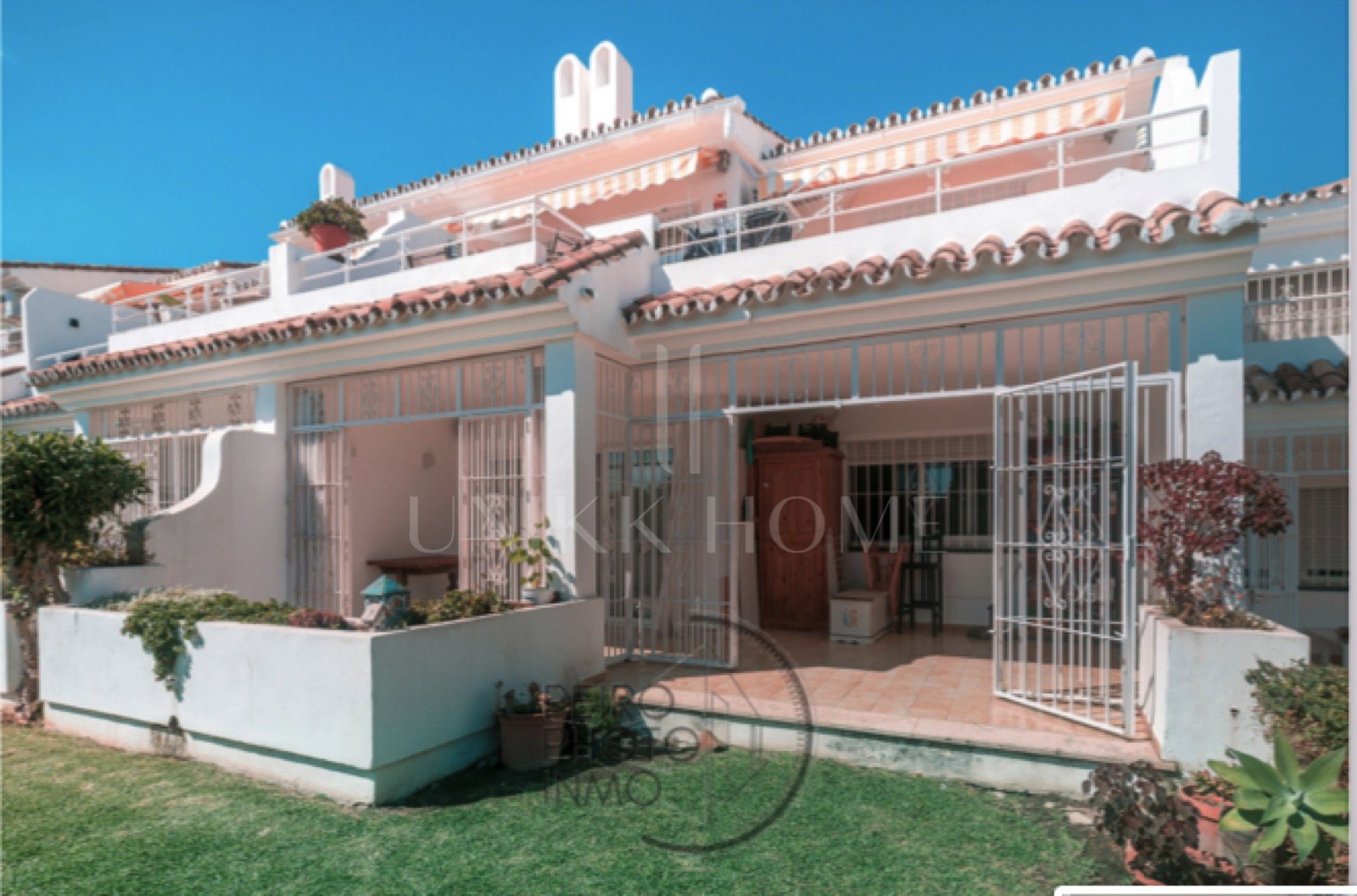Elegant, bright apartment with large terrace & direct garden access in a tranquil gated community