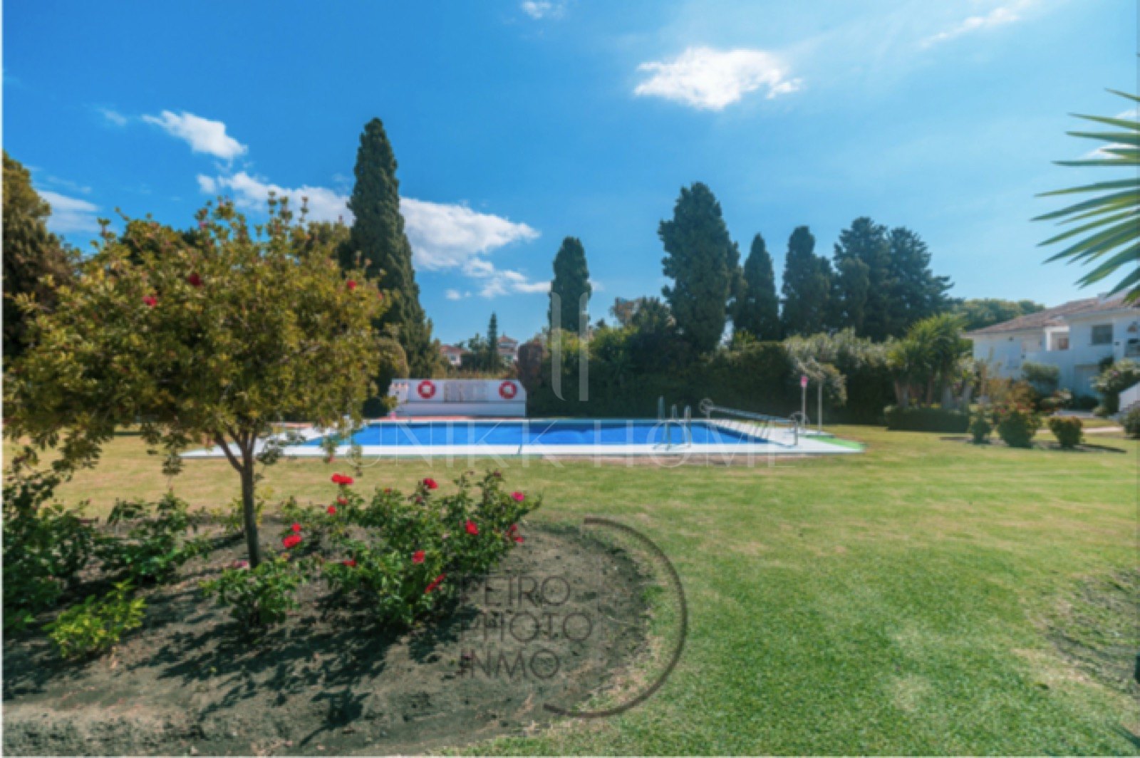 Elegant, bright apartment with large terrace & direct garden access in a tranquil gated community