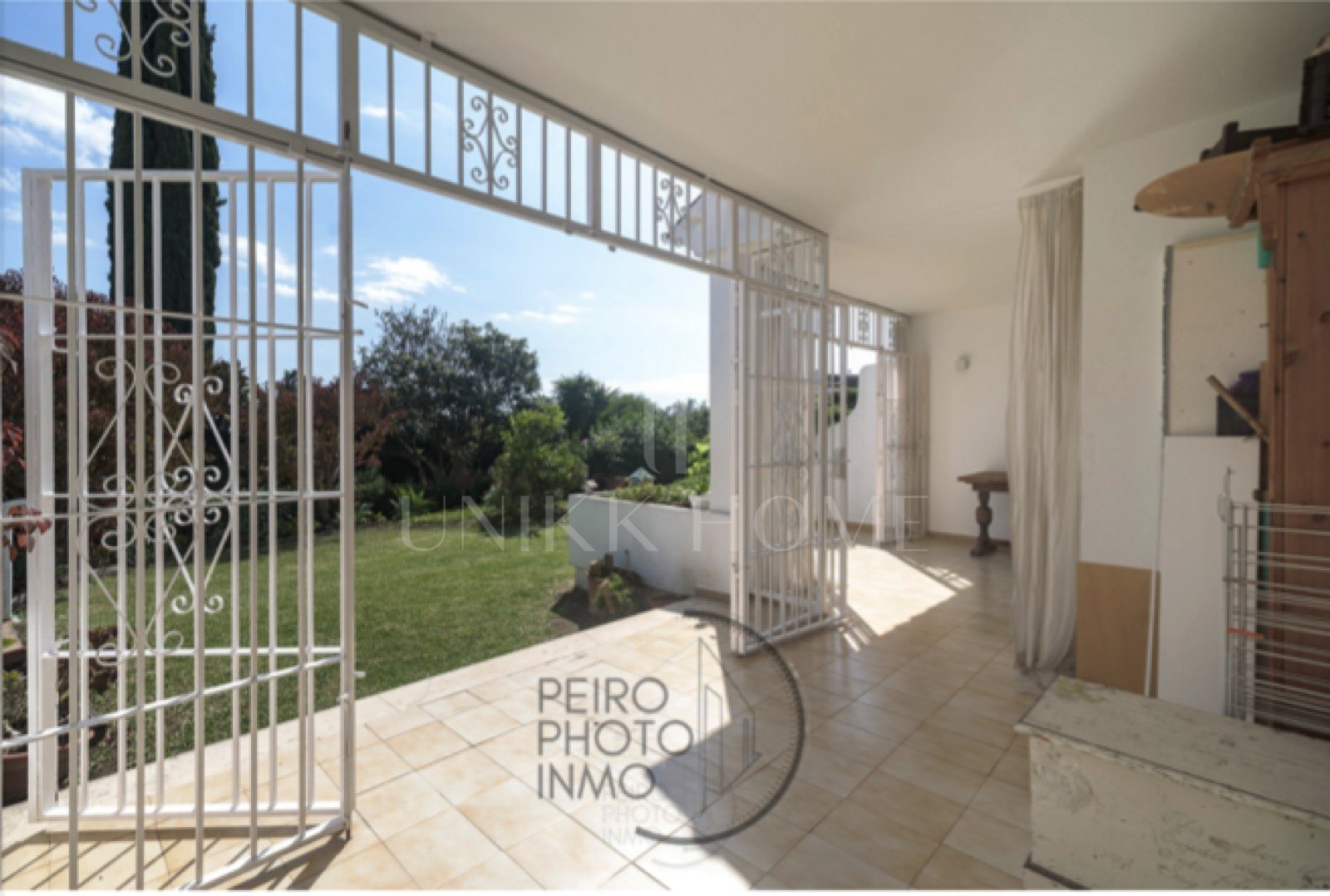 Elegant, bright apartment with large terrace & direct garden access in a tranquil gated community