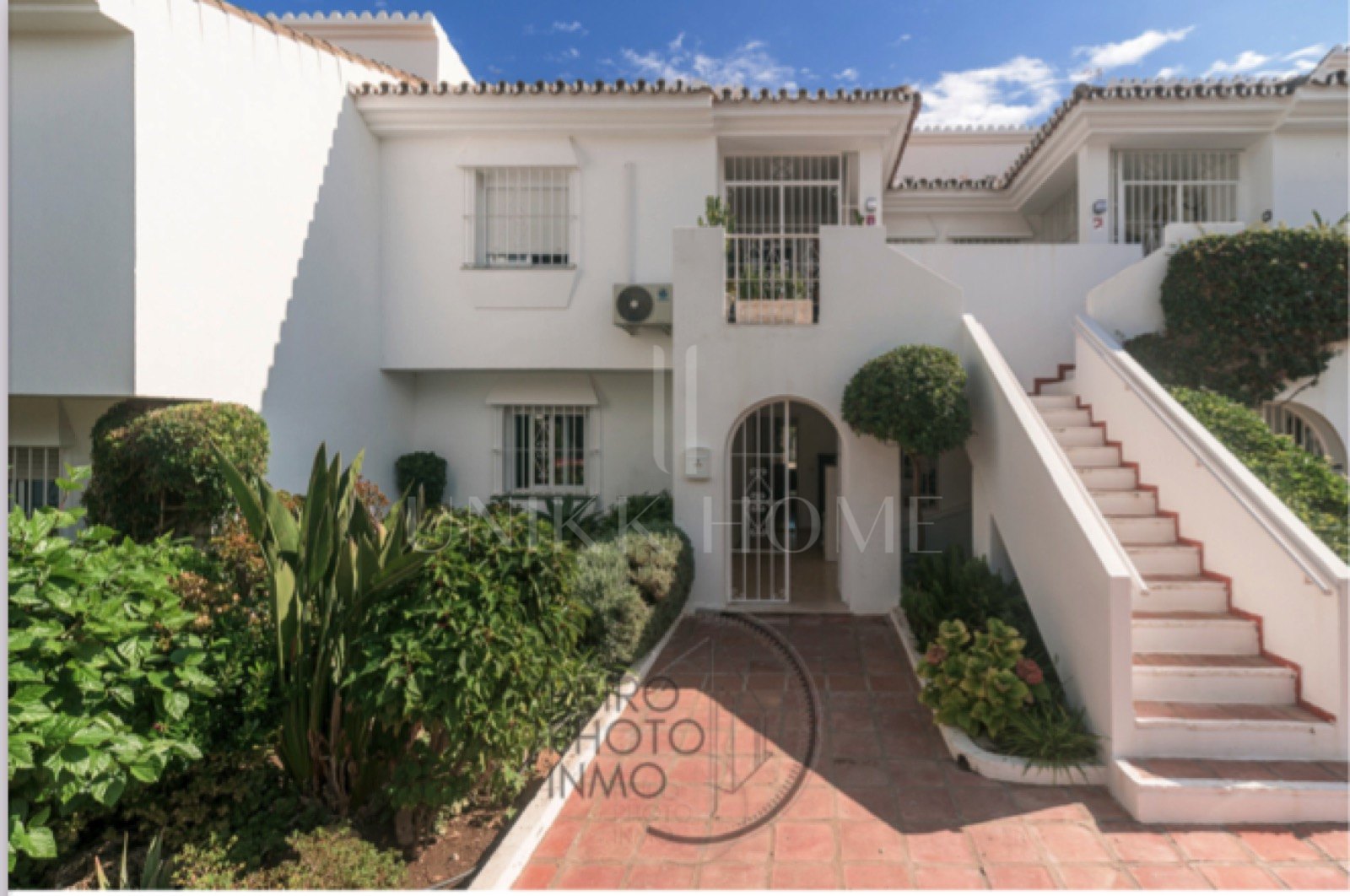 Elegant, bright apartment with large terrace & direct garden access in a tranquil gated community