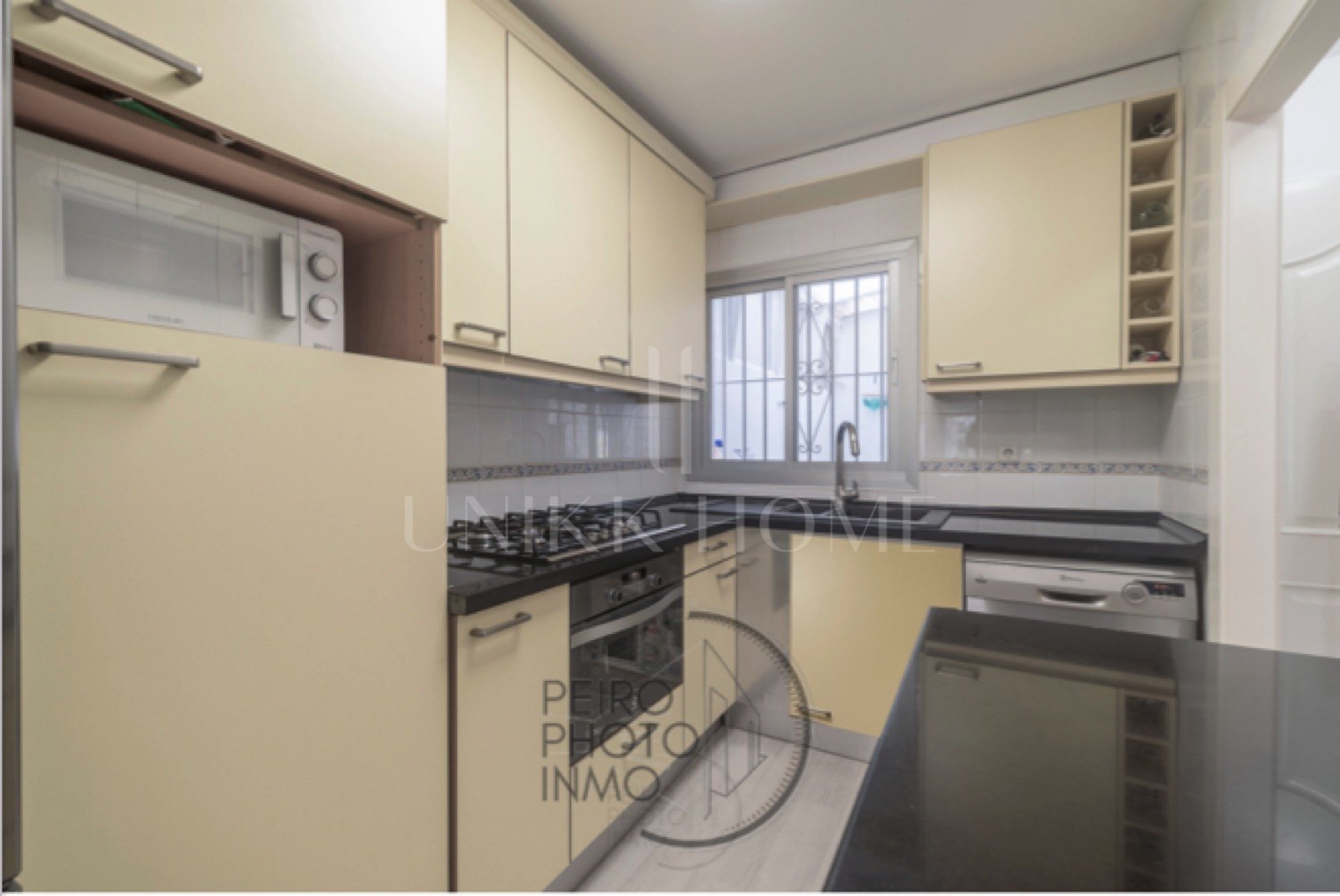 Elegant, bright apartment with large terrace & direct garden access in a tranquil gated community