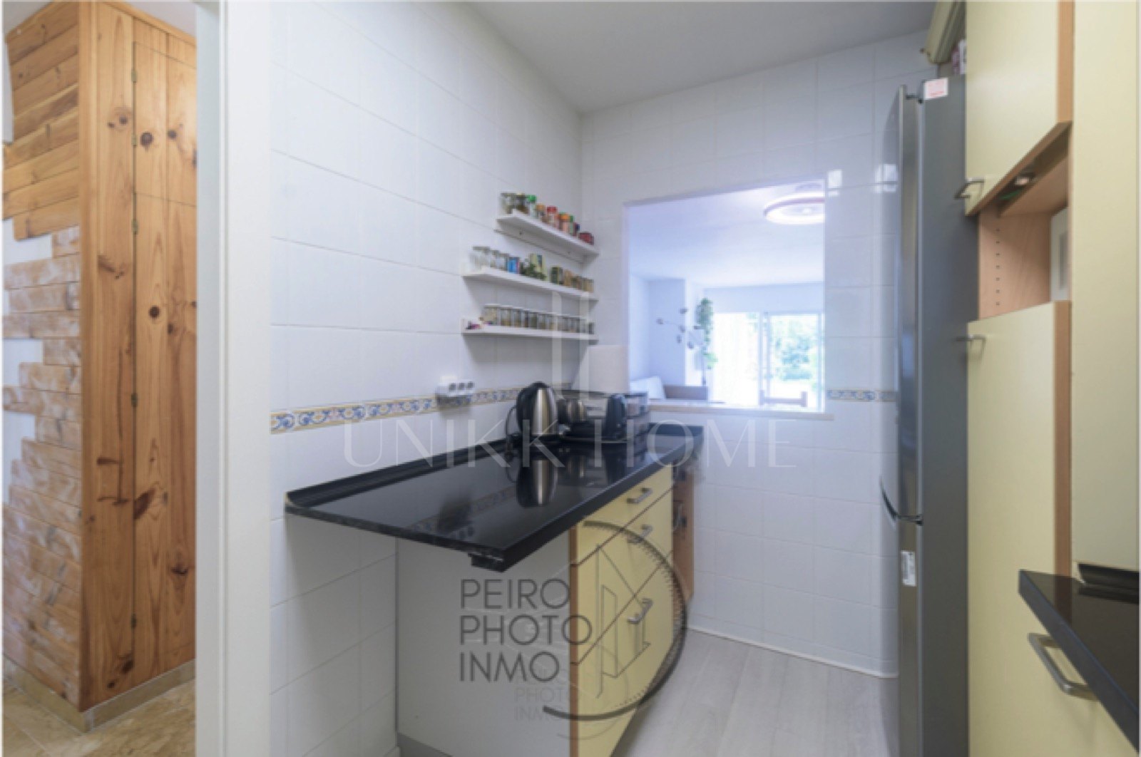 Elegant, bright apartment with large terrace & direct garden access in a tranquil gated community